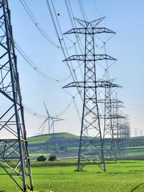 transmission towers on field