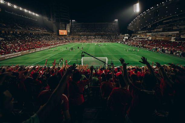 exciting night football match in a packed stadium