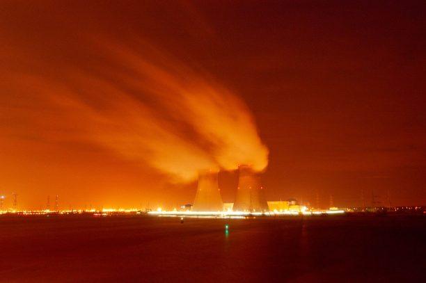 nuclear power plant cooling towers at night